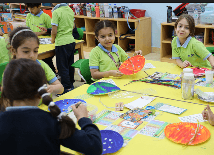 Children painting and creating during a creative learning activity